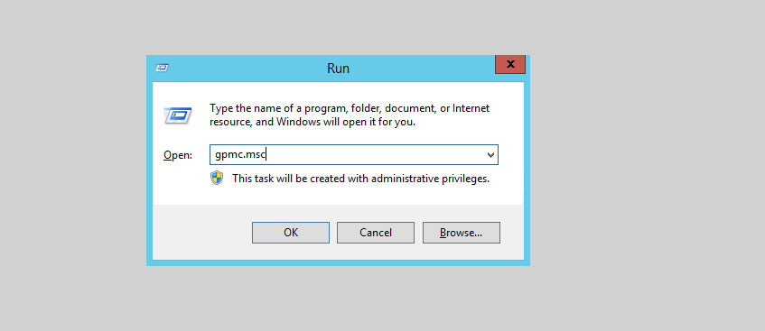 Opening the Group Policy Management console by running gpmc.msc in Windows Run command